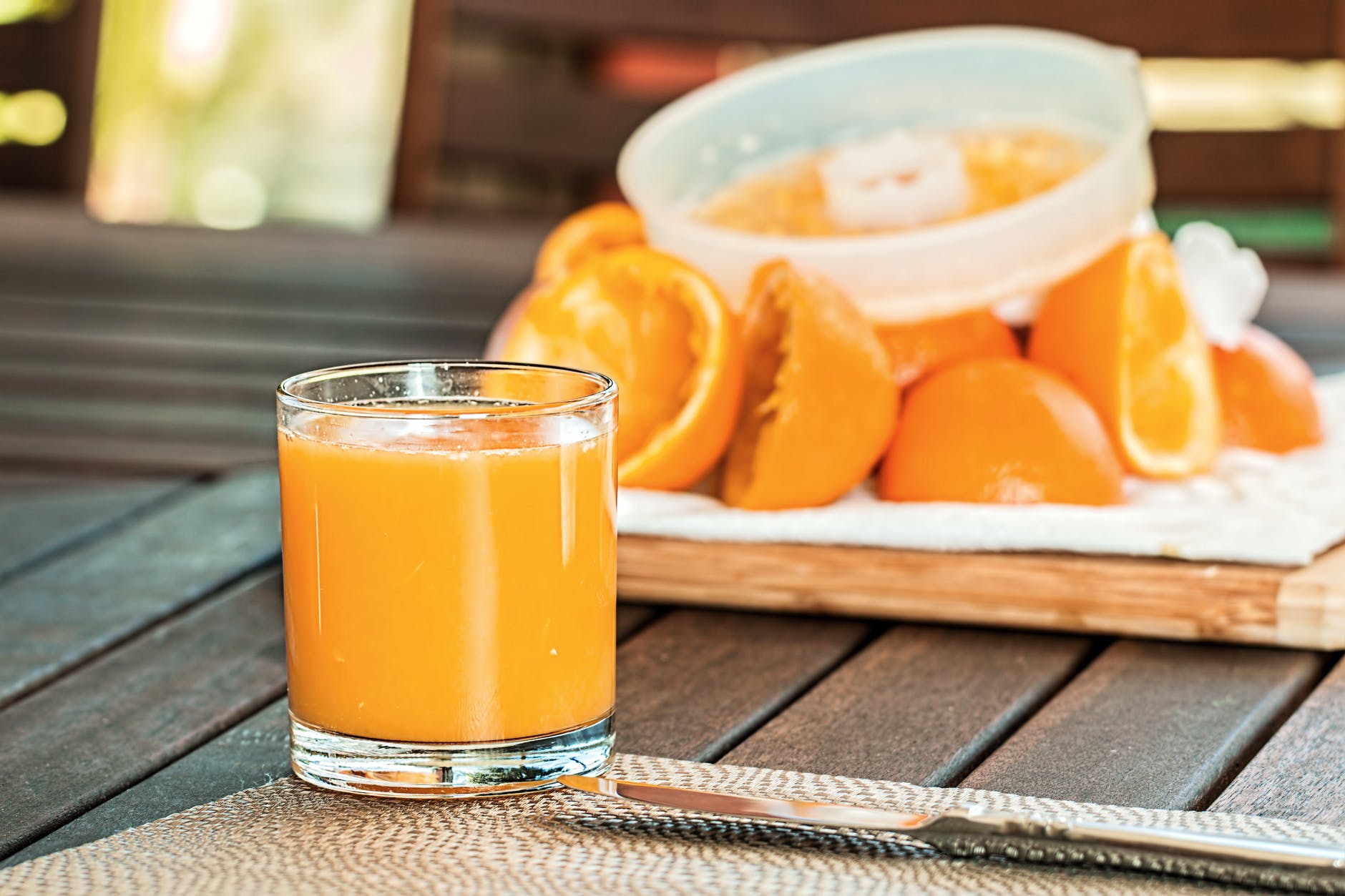 selective focus photography of pure orange juice